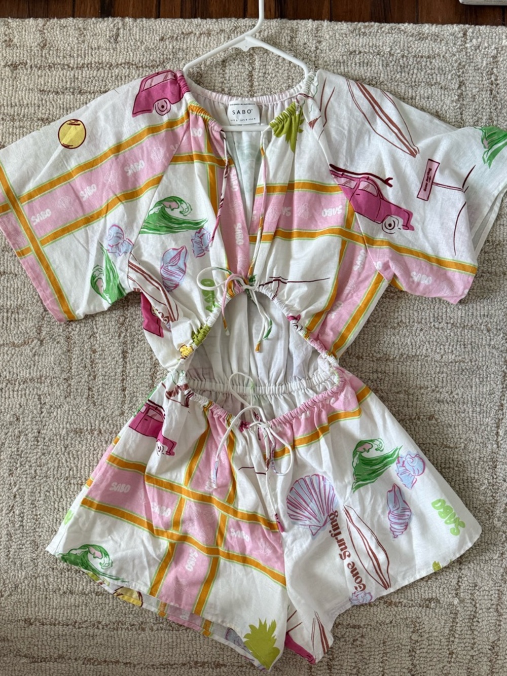 Sabo Short Sleeve Cutout Romper in White with Pink & Green Print